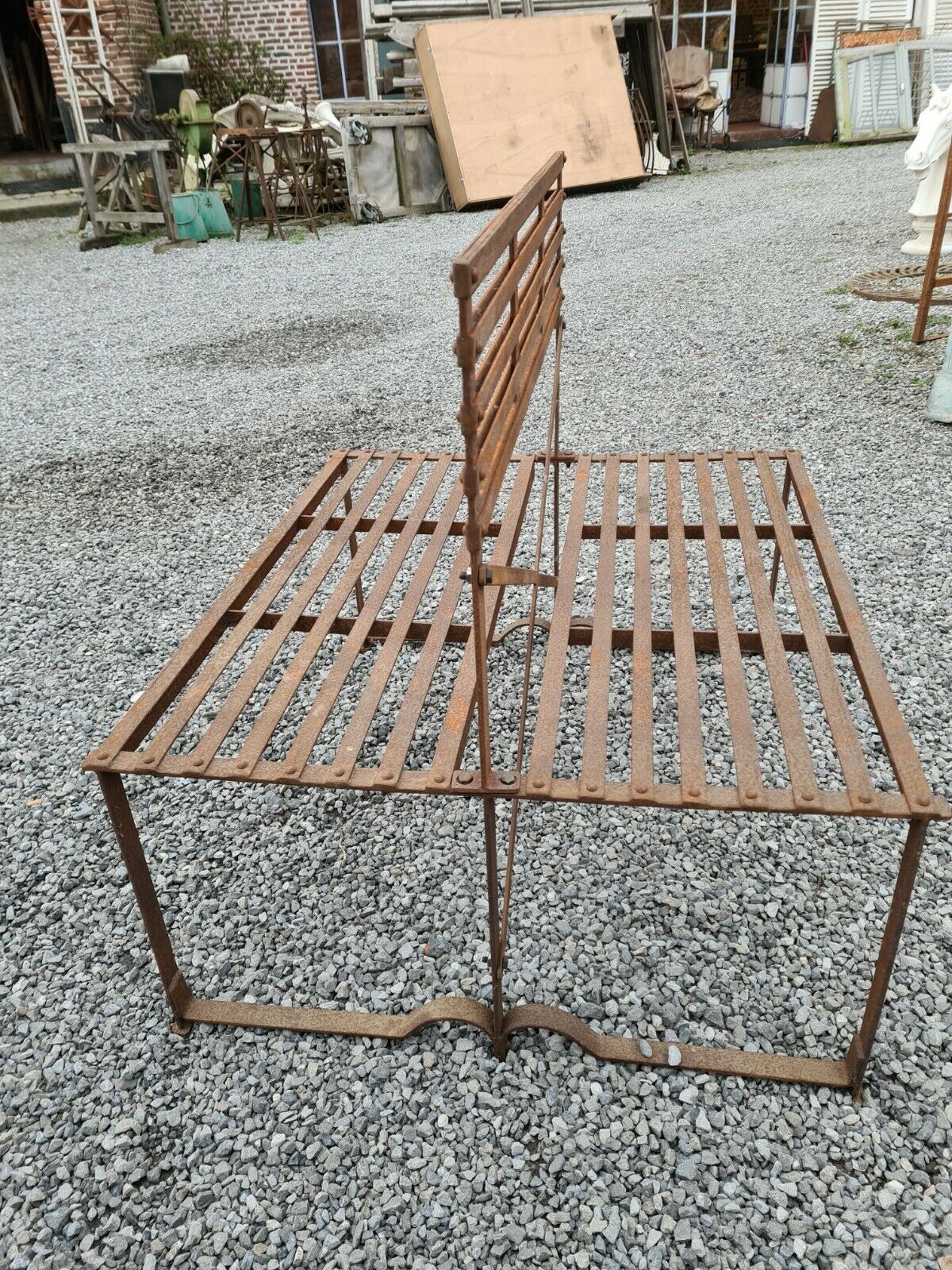 Wrought iron back-to-back garden bench