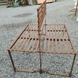 Wrought iron back-to-back garden bench