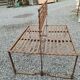 Wrought iron back-to-back garden bench