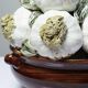 Vintage trompe-l'œil garlic pyramid in glazed ceramic from Manises, Spain.