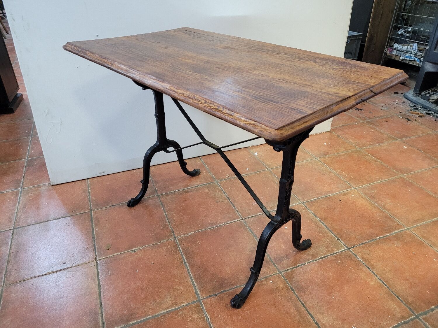 Old bistro table with oak top