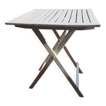 Table jardin pliante en bois peinte en beige grisé carrée
