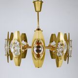 Oscar Torlasco brass chandelier of 25 inches with optical prism lenses, Italy, 1970s.