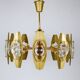 Oscar Torlasco brass chandelier of 25 inches with optical prism lenses, Italy, 1970s.