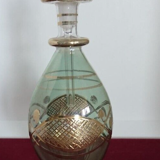 Vial / perfume bottle in tinted and cut glass golden border