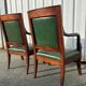 Paire de fauteuils de style Empire en acajou et cuir vert