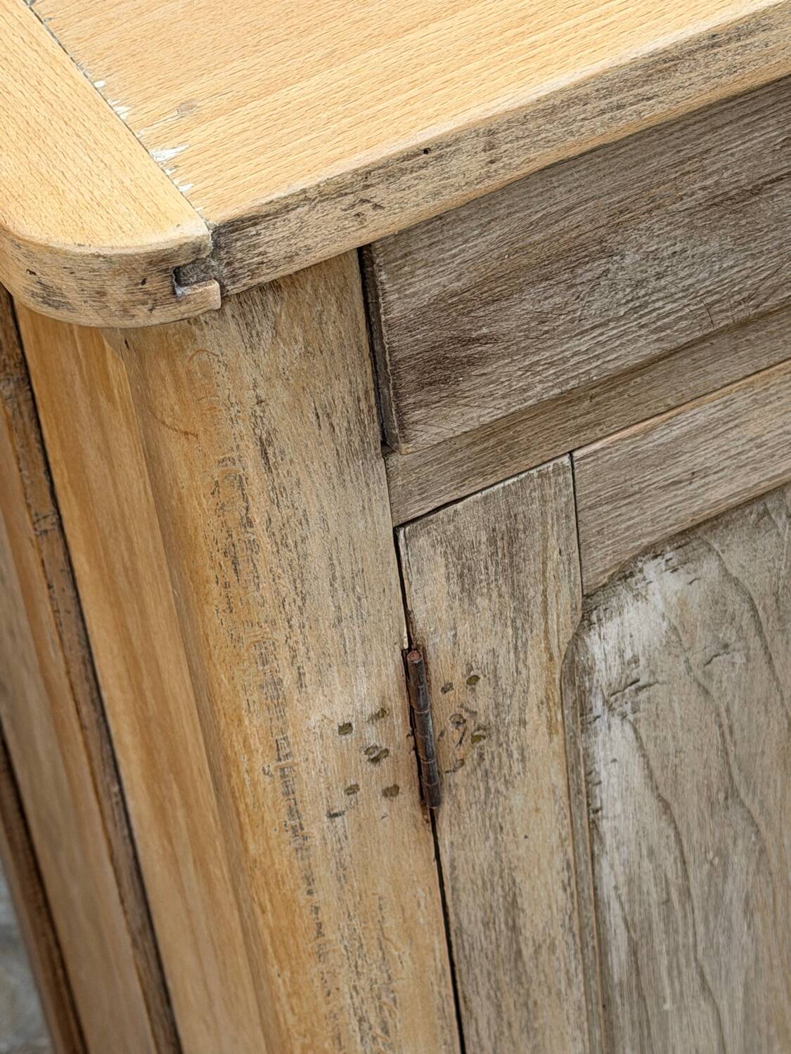 Antique patinated Parisian buffet with shell handles.
