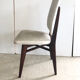 Chaise bois et skaï blanc vintage