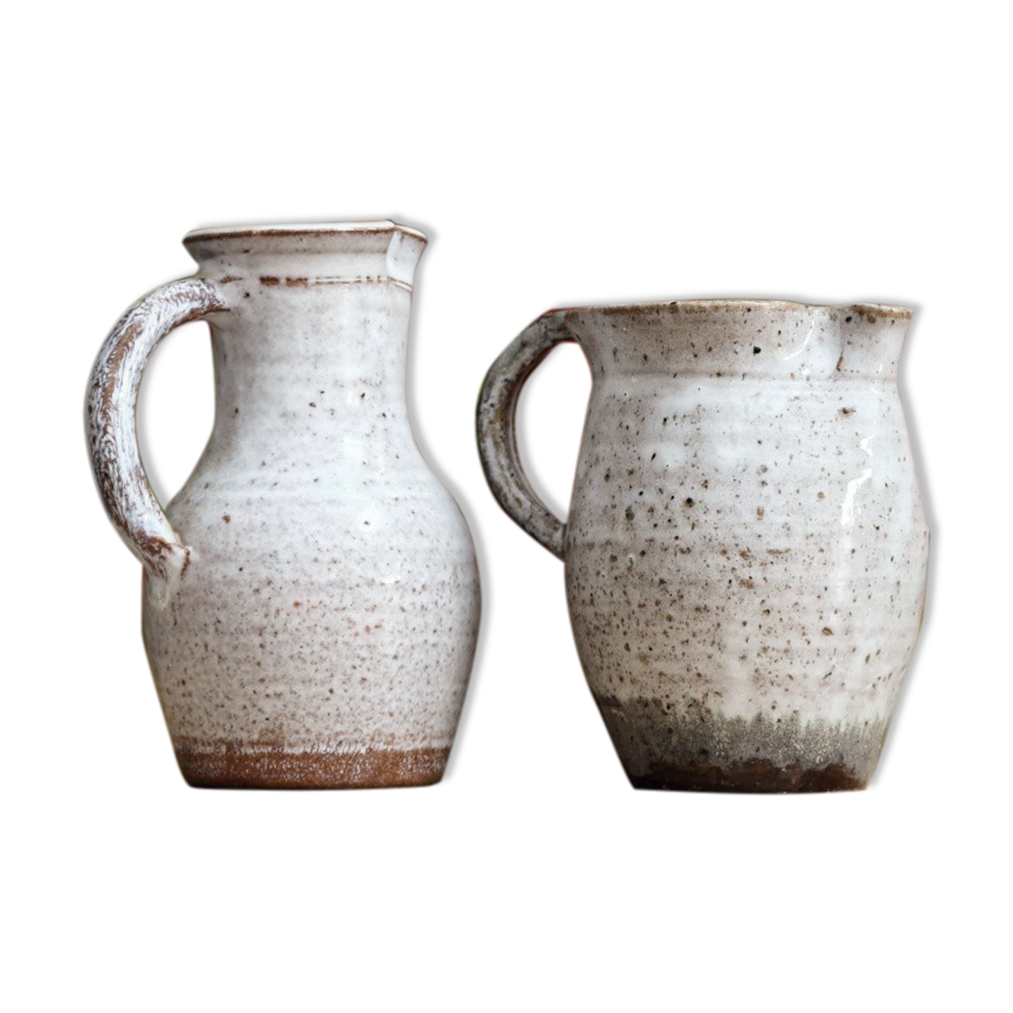 Pair of glazed terracotta pitchers