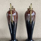 Two large stoneware vases with bronze fittings.