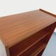 Vintage wooden bookshelf in teak style from the 1960s.