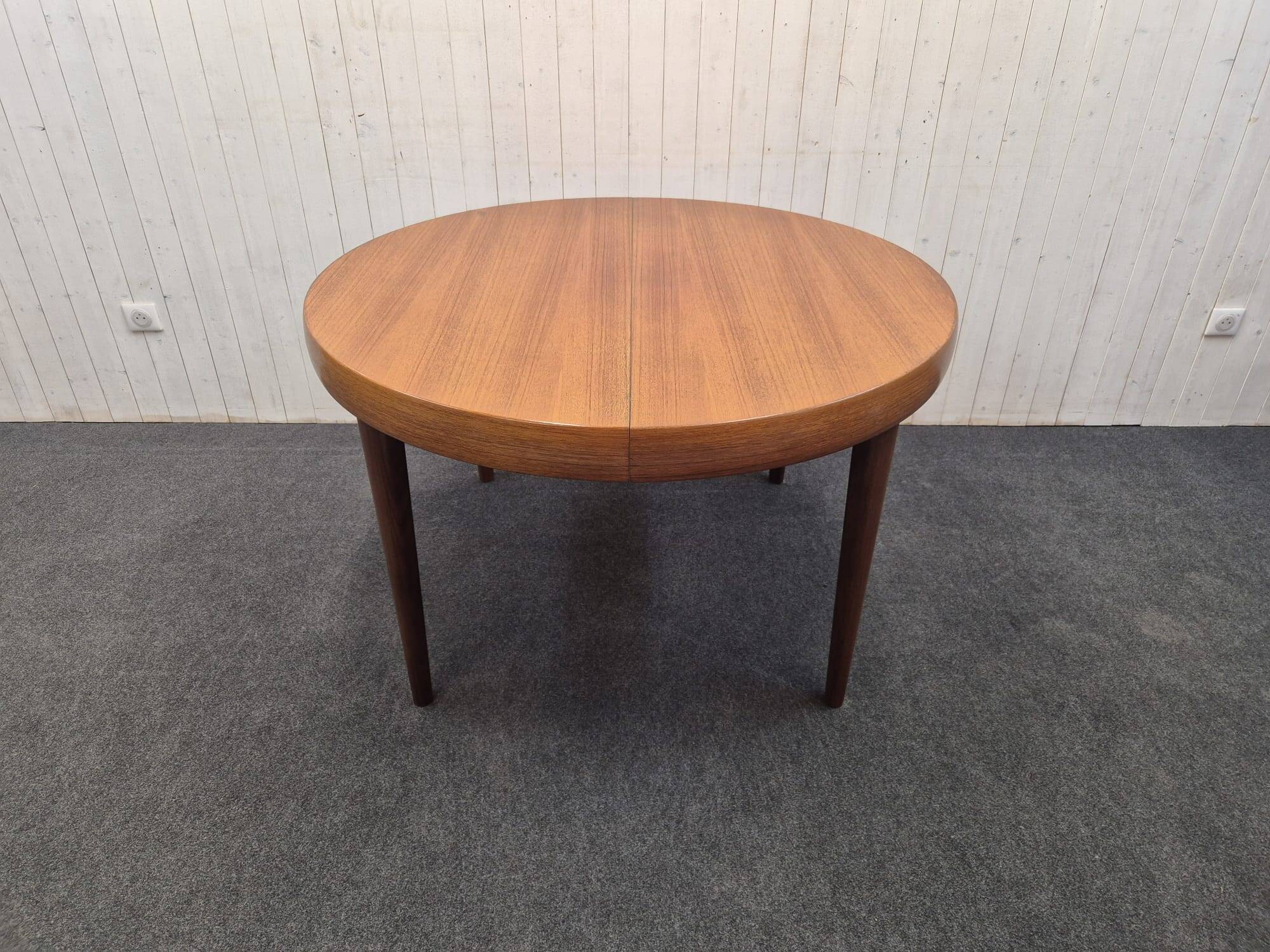 Vintage Scandinavian table with double butterfly extension.