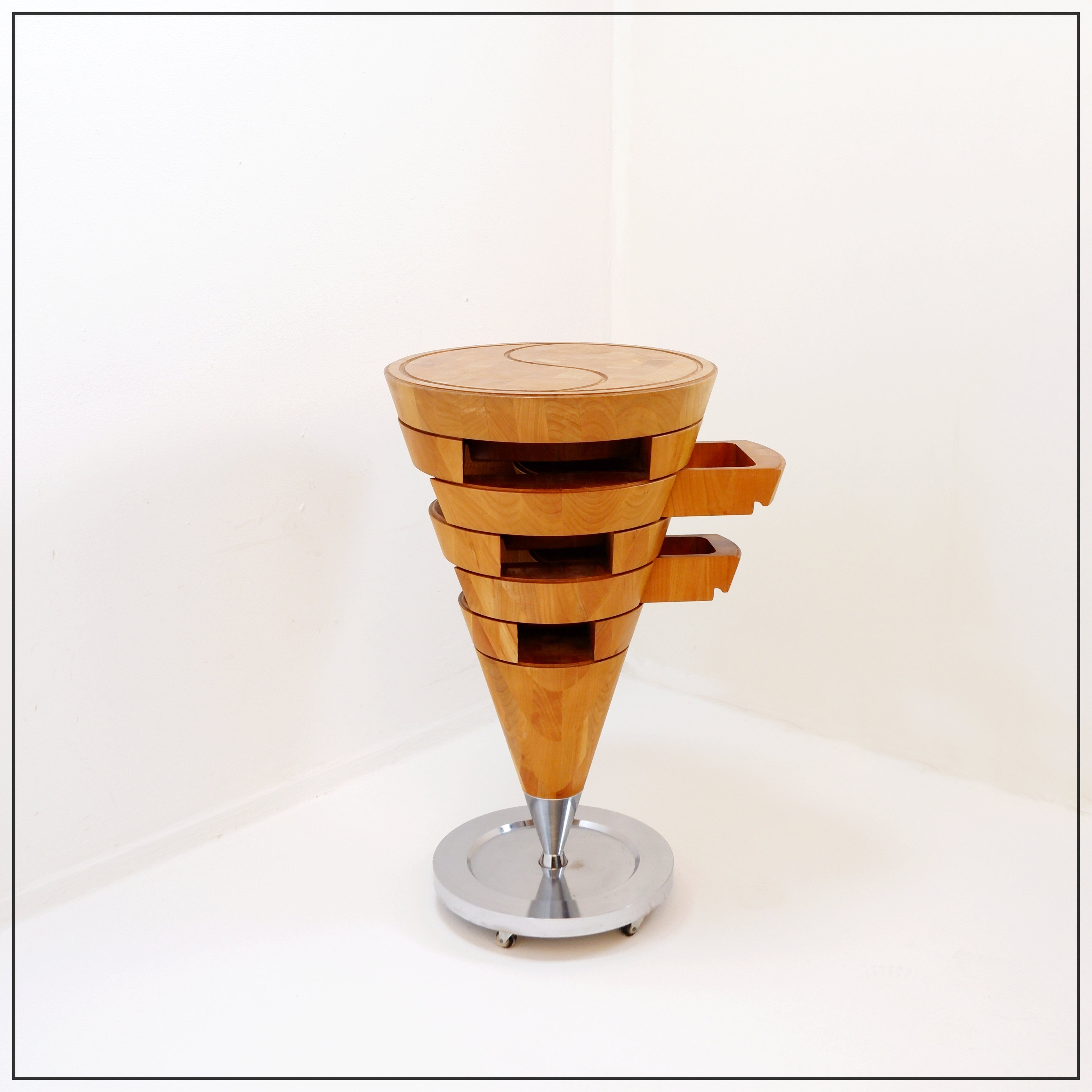 Cone-shaped kitchen unit with drawers