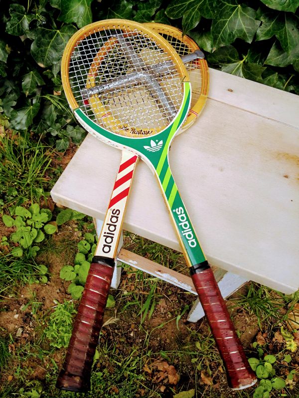 Pair of vintage Adidas Ilie Nastase & Junior tennis rackets