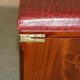 Crocodile leather and hardwood luggage rack in Mid-Century Modern style