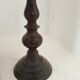 Two pairs of patinated brass candle holders
