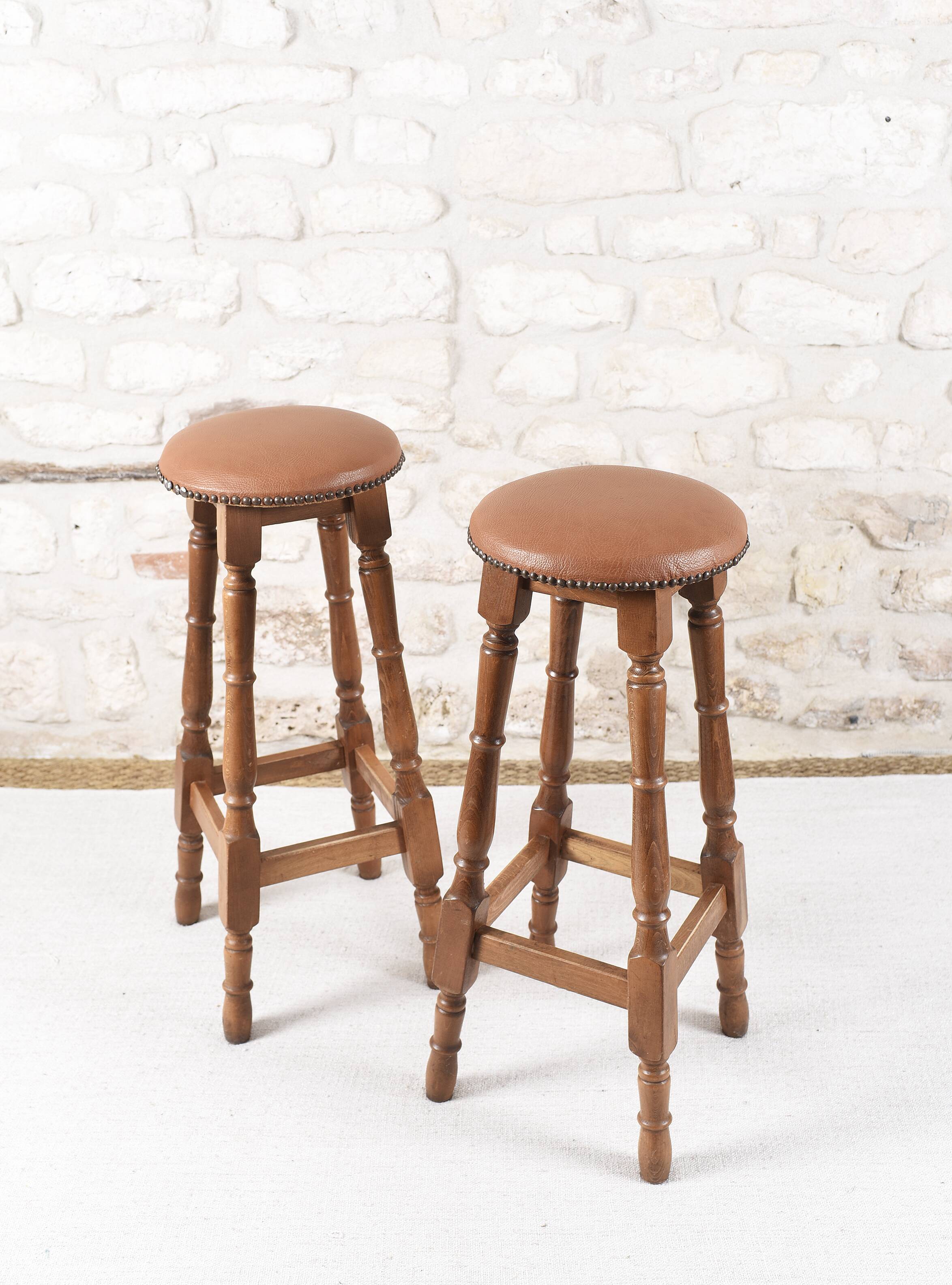 Antique bar stools, brown leather and wood