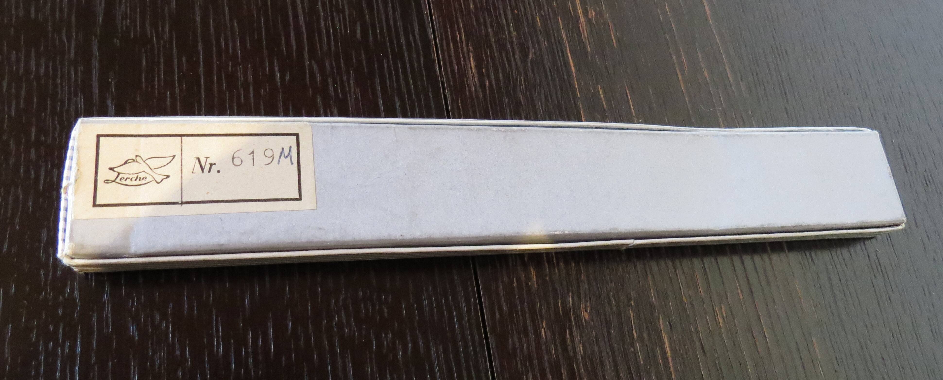 Vintage design paper cutter in two-tone metal LERCHE