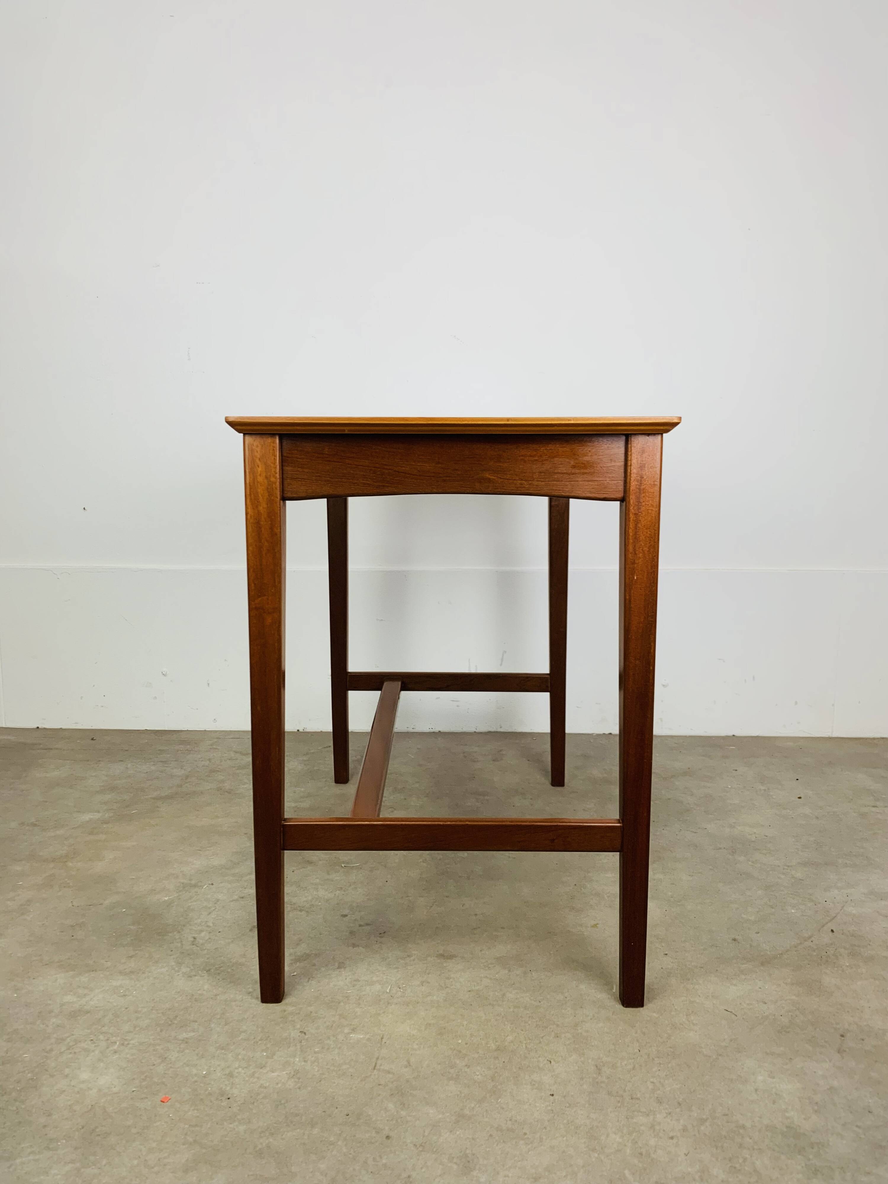 Minimalist Scandinavian teak desk from the 1960s, vintage.
