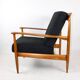 Black boucle chair, Danish design on the cushions, 1970s.