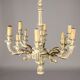 Antique chandelier in gilded and lacquered wood, Italy, 20th century.