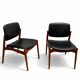 Captain chair pair by Erik Buch
