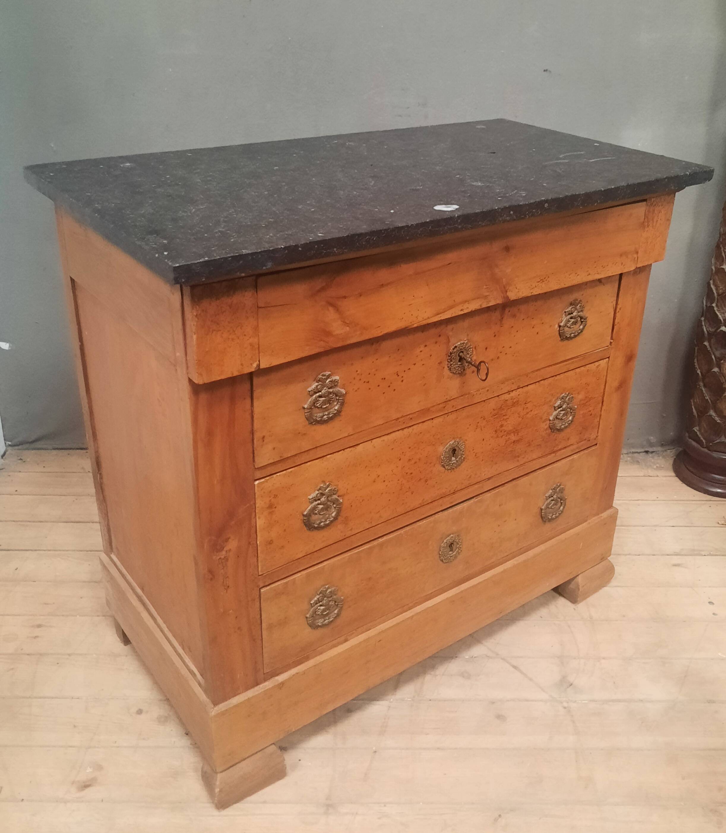 Nineteenth-century commode with marble top.