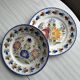 2 decorative plates in Quimper earthenware, signed HB Henriot.