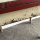 Rustic red and cream wooden dining table, moulded top, 1950s.