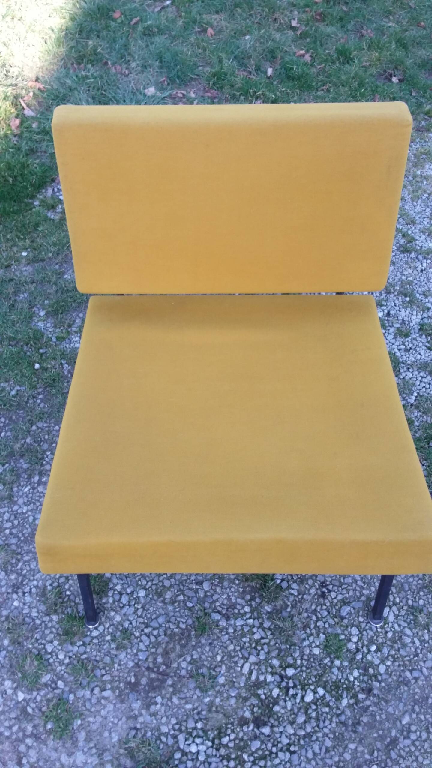 Vintage 50s armchair with black metal base and fabric seats