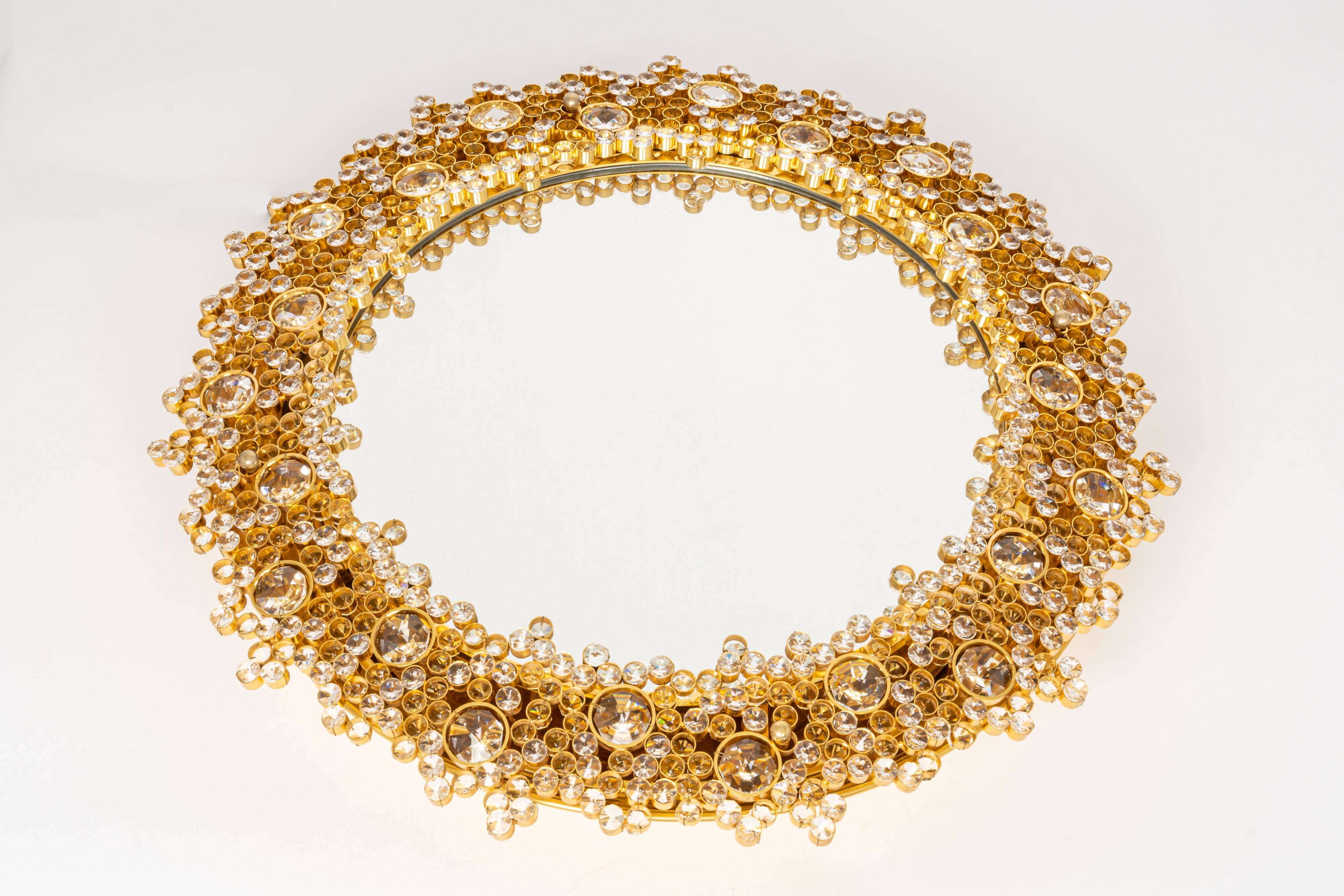 Spectacular backlit mirror in gilded brass and crystal glass by Palwa, Germany.