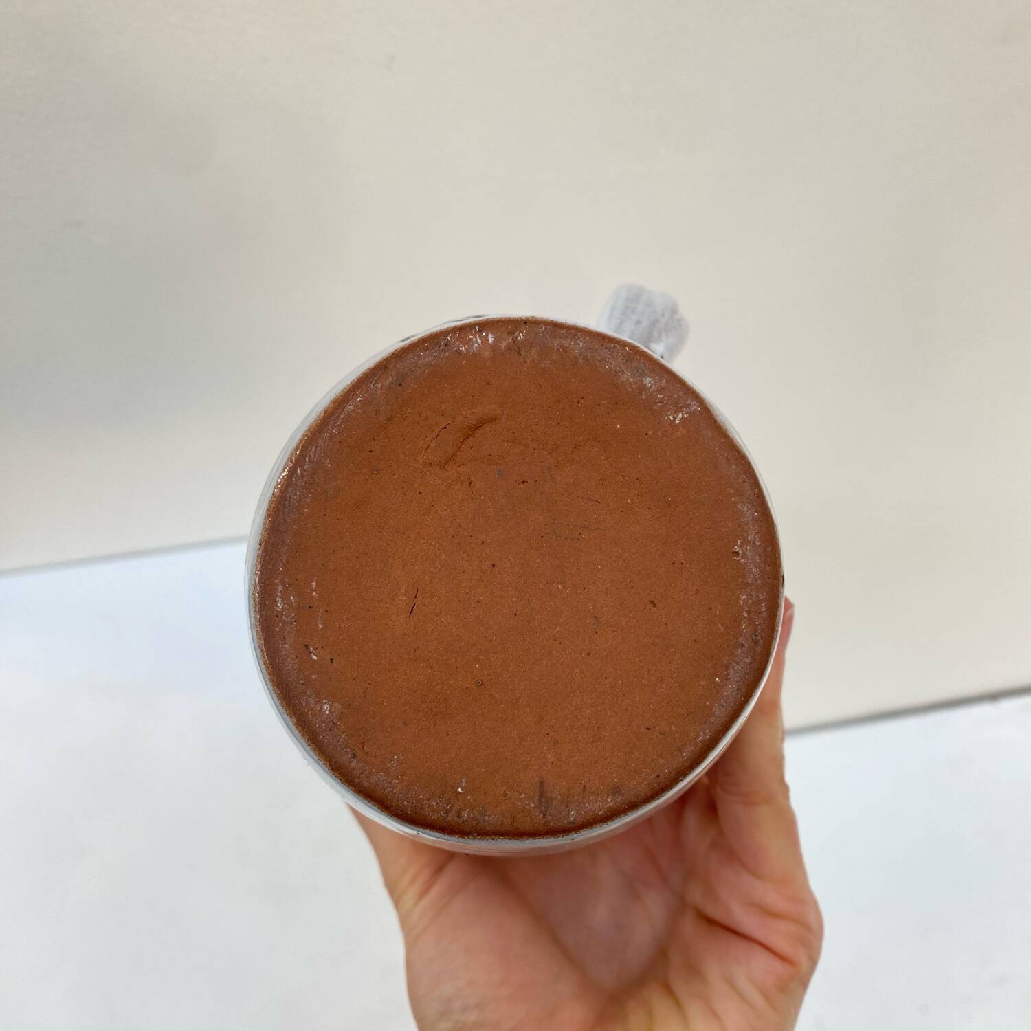 Enameled stoneware pitcher by Jeanne and Norbert Pierlot