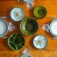 5 plates, mismatched dishes