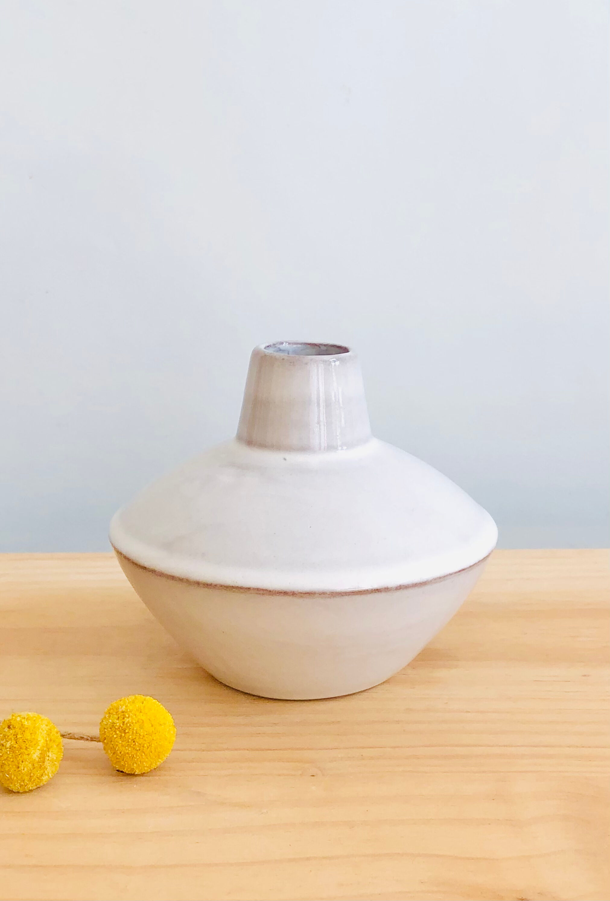 White enamelled terracotta vase