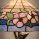 Art Nouveau Table Lamp in Burnished Brass and Coloured Glass (c. 1980)