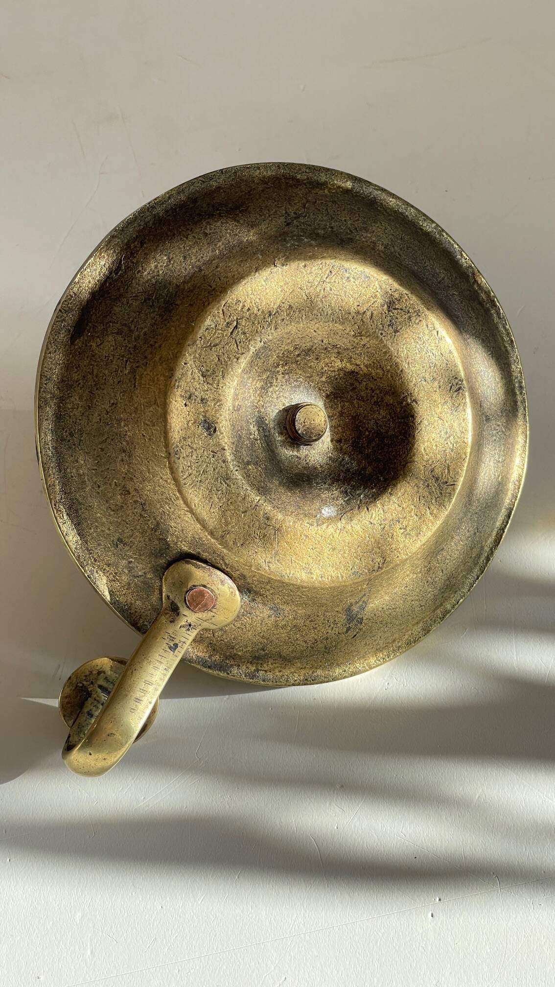 Antique solid bronze hand candlestick