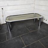 Designer coffee table in chromed metal with smoked glass top
