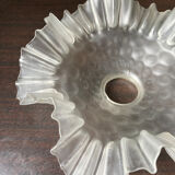 Transparent molded glass suspension in flower shape