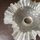 Transparent molded glass suspension in flower shape