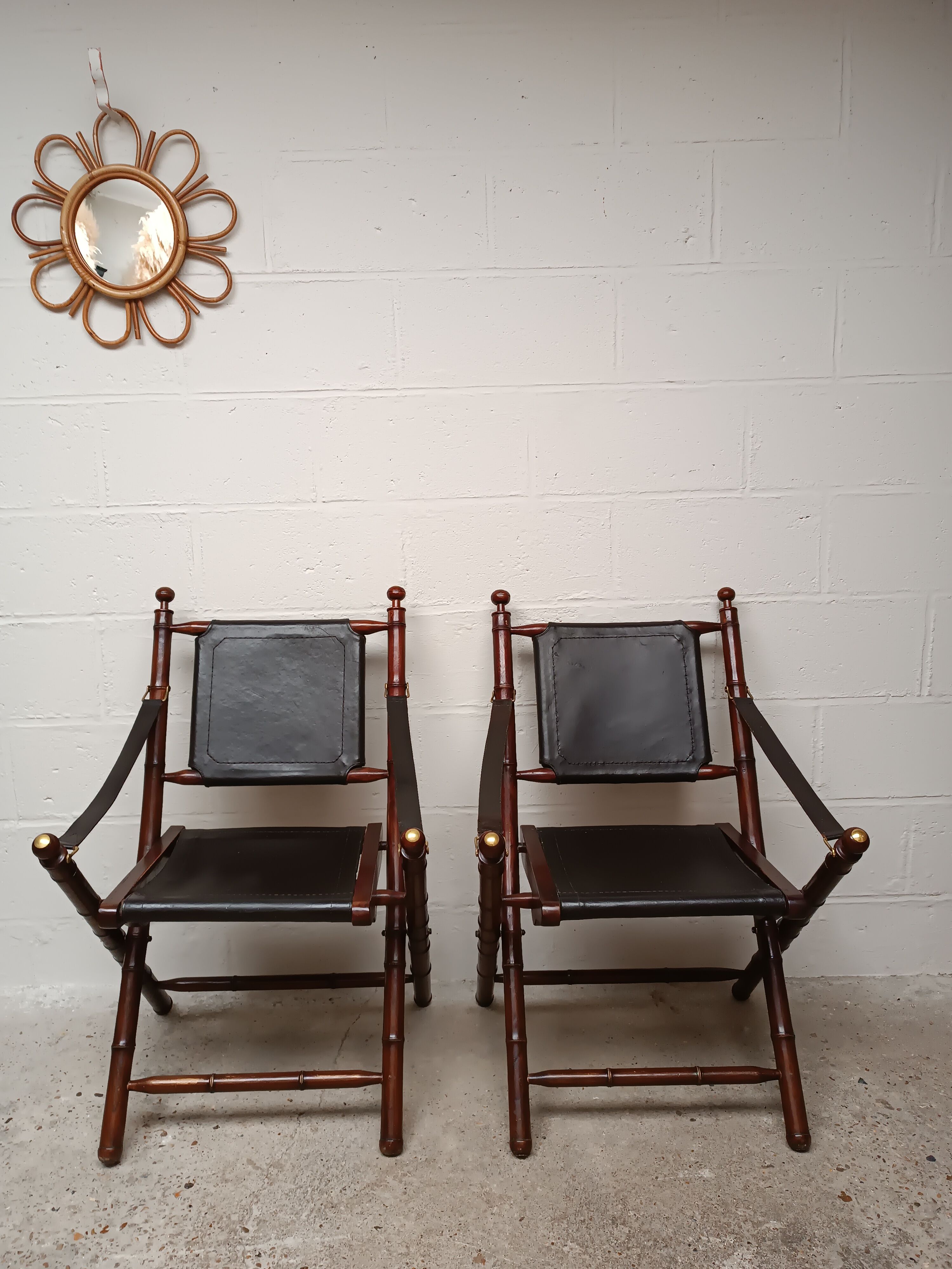 Pair of vintage "safari" folding armchairs in mahogany and leather
