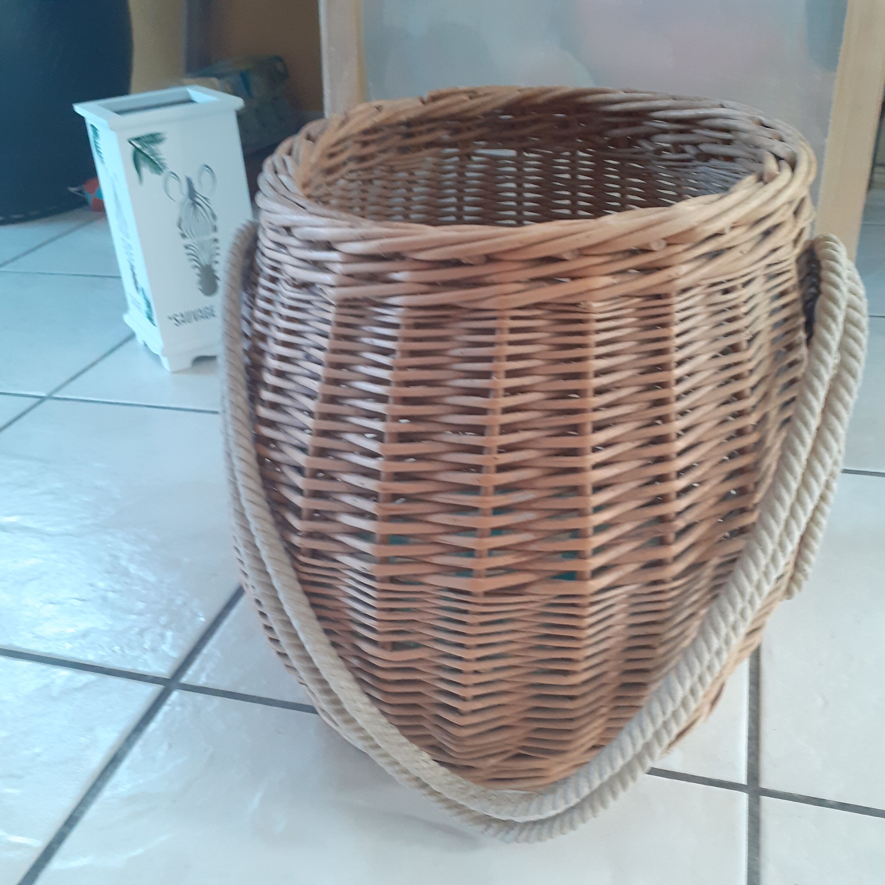 Old rattan basket. round with 2 rope handles.