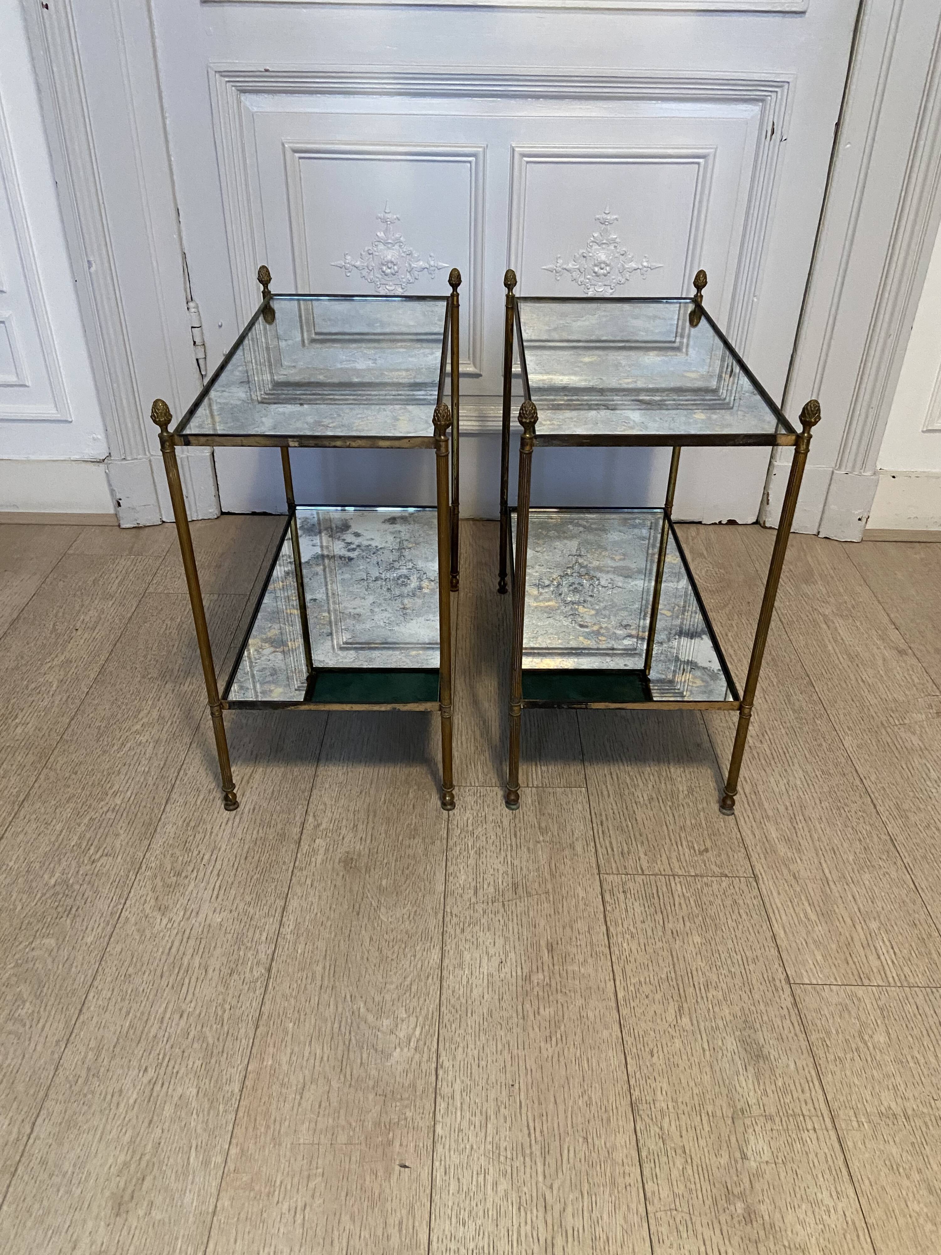 Pair of neo classic brass side tables and oxidized mirror