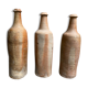 Trio de bouteilles en grès naturel