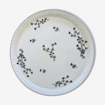 Ancient dish with floral decoration