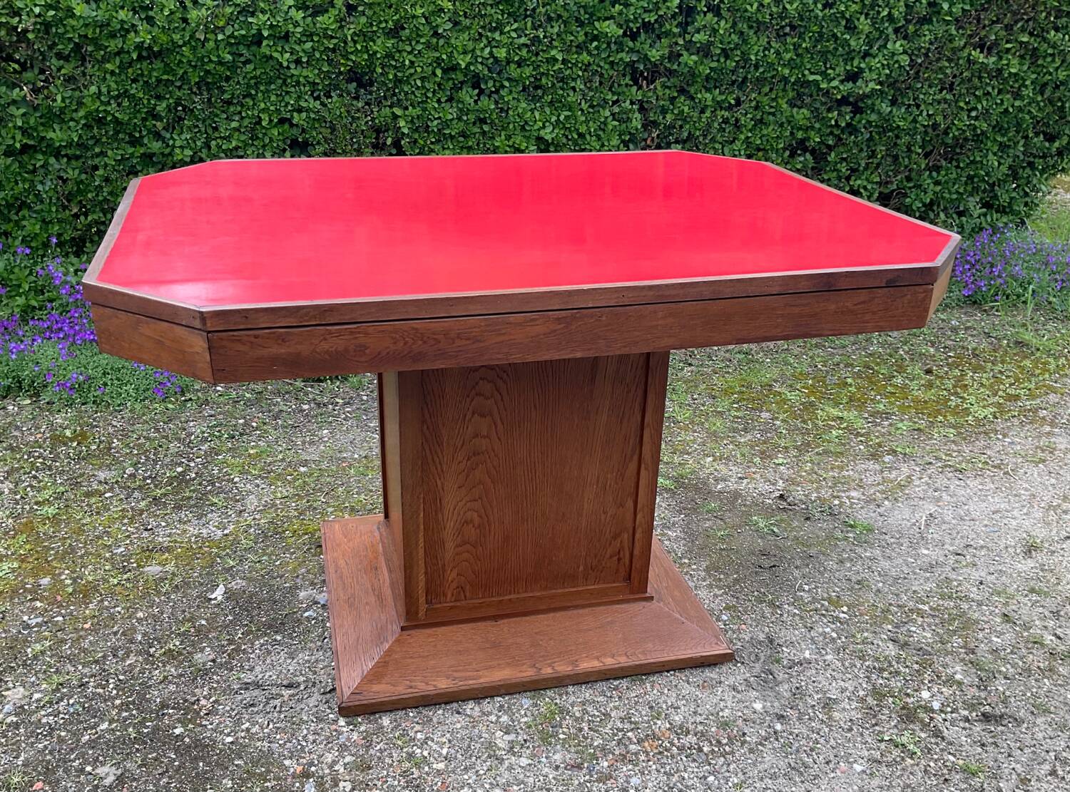 Art Deco dining table in wood and red Formica