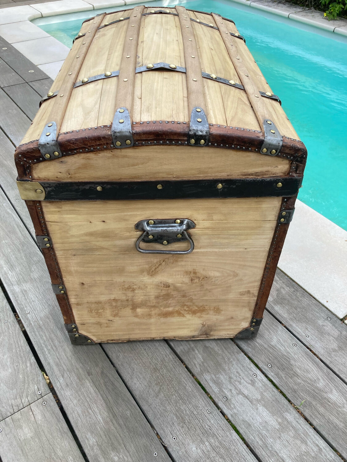 Exceptional curved leather/brass box with beautiful restored clasps.