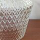 Suspension made of moulded glass with diamond pattern.