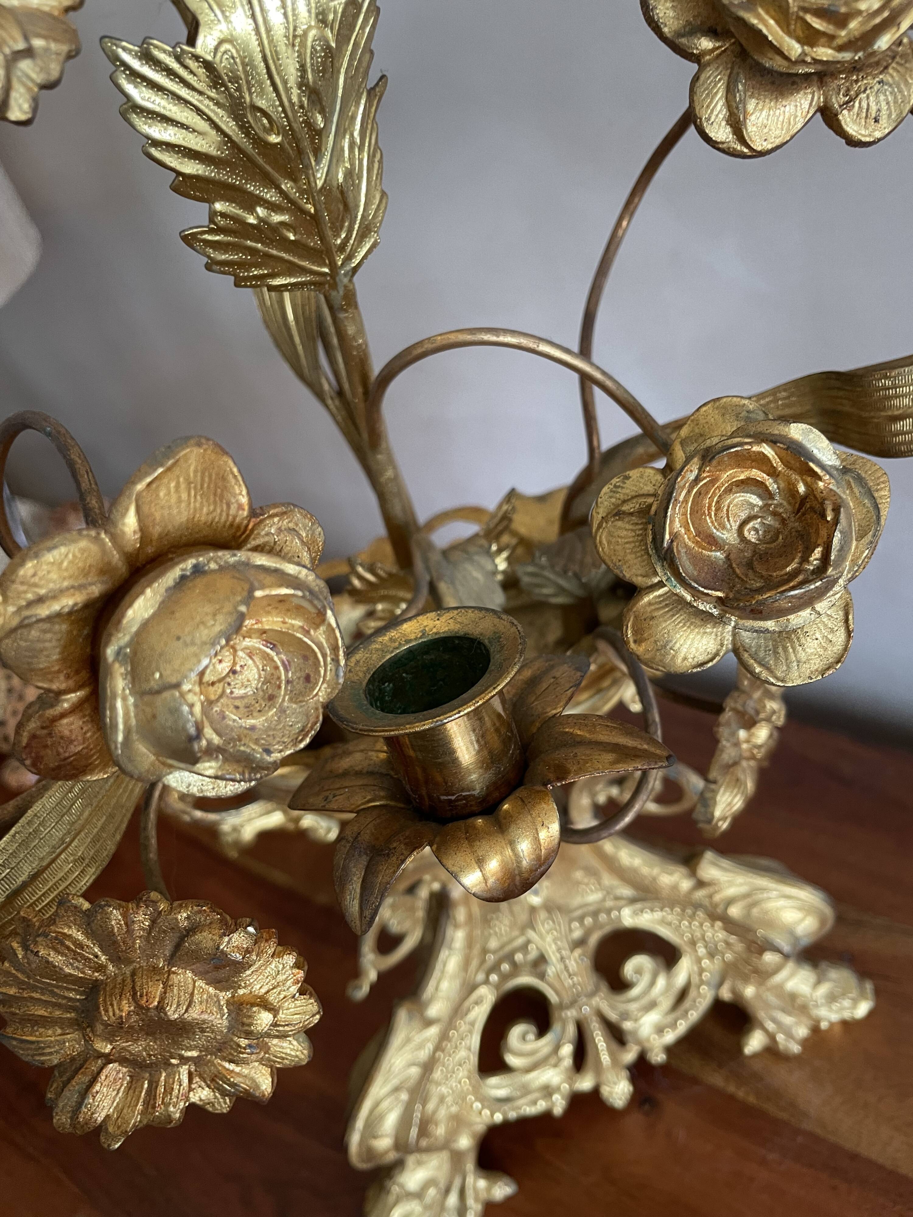 Brass church candelabra with fleur-de-lys