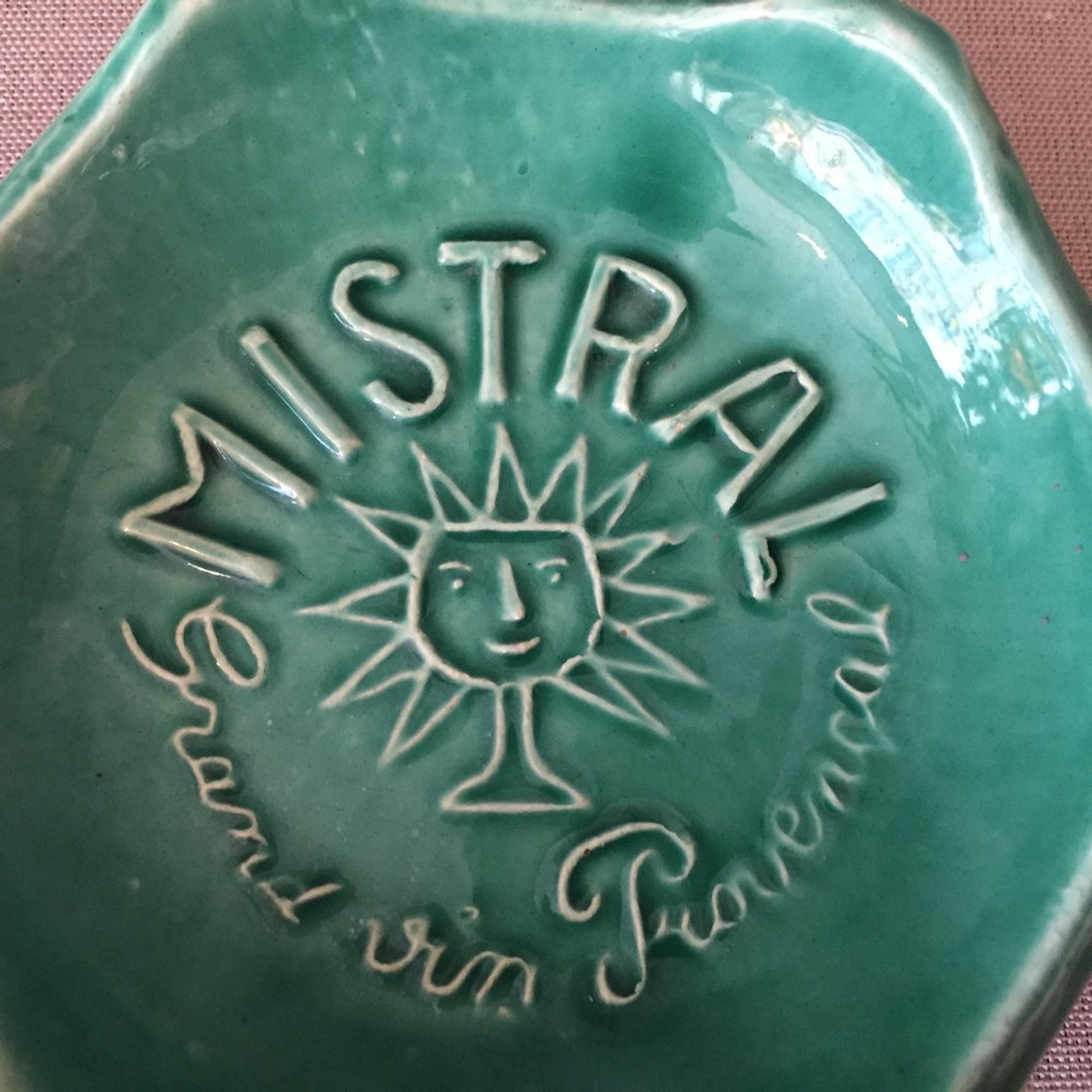 Ashtray or picks up advertising money for the great provencal mistral wine