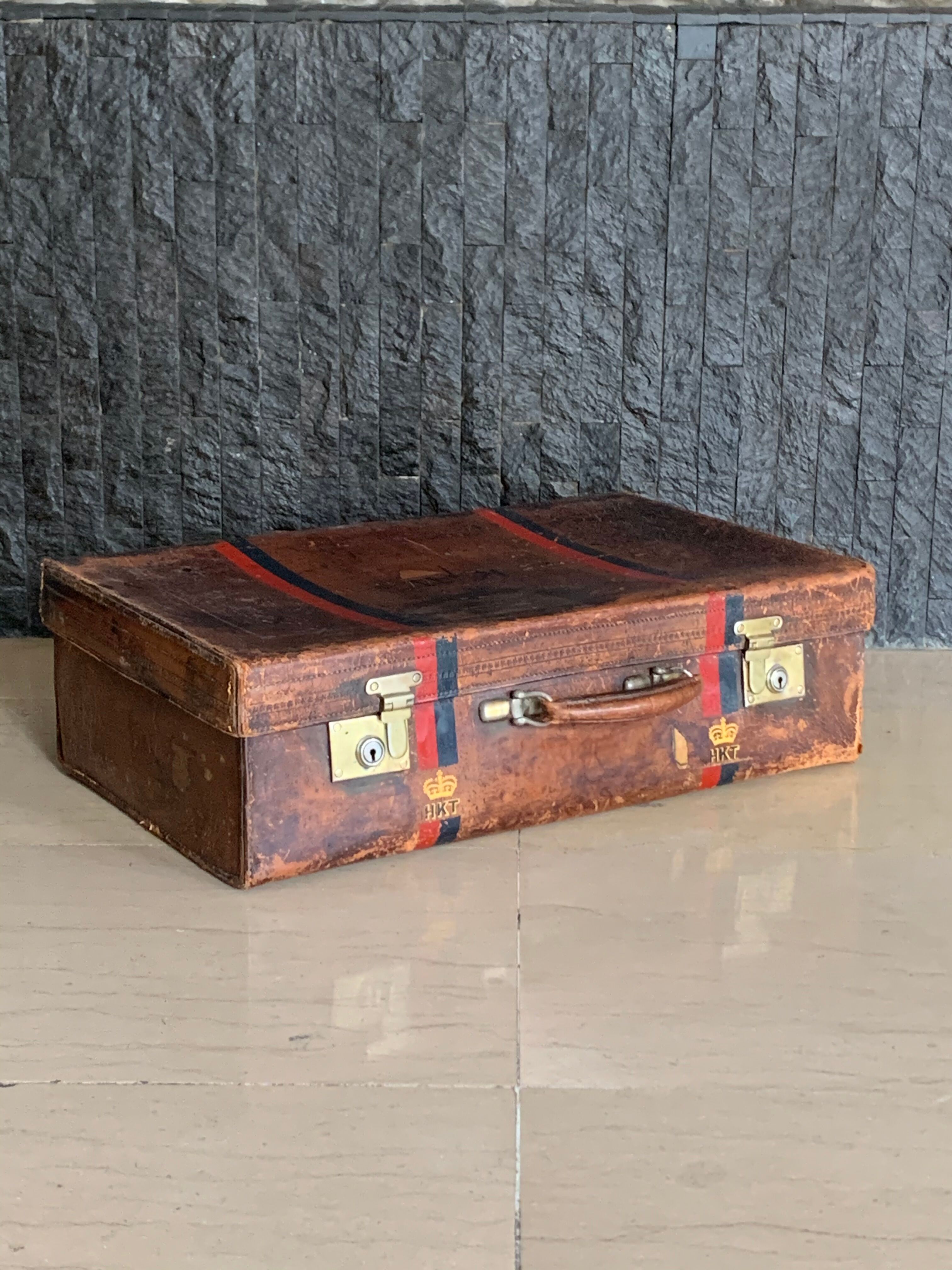 Rare old English suitcase stamped with the royal crown